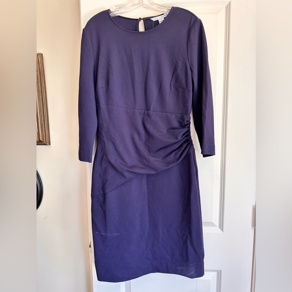 Ladies dress/ not purple but not blue in color/ never worn/ tags/ will dry clean